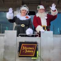 Santa and Mrs. Clause on train